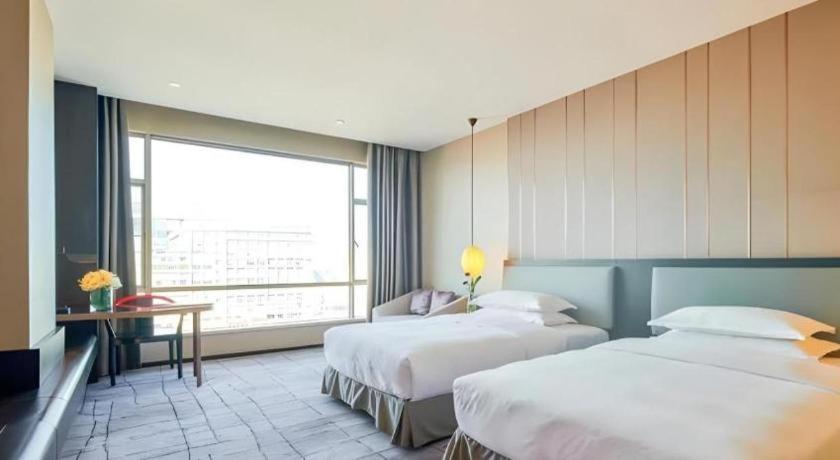 Maison New Century Hotel Dongguan Dongguan  Esterno foto